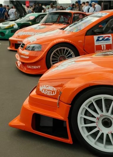 Professional auto mechanic working on car